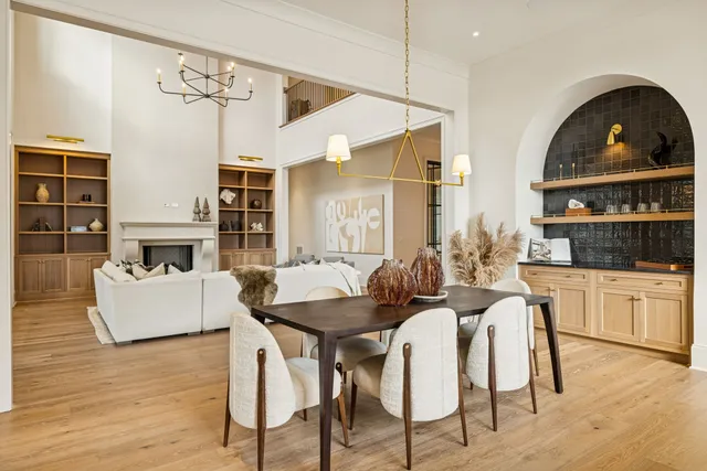 a bathroom with a sink vanity and mirror
