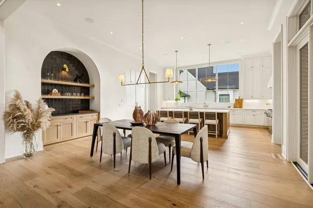 a bathroom with a sink vanity and mirror