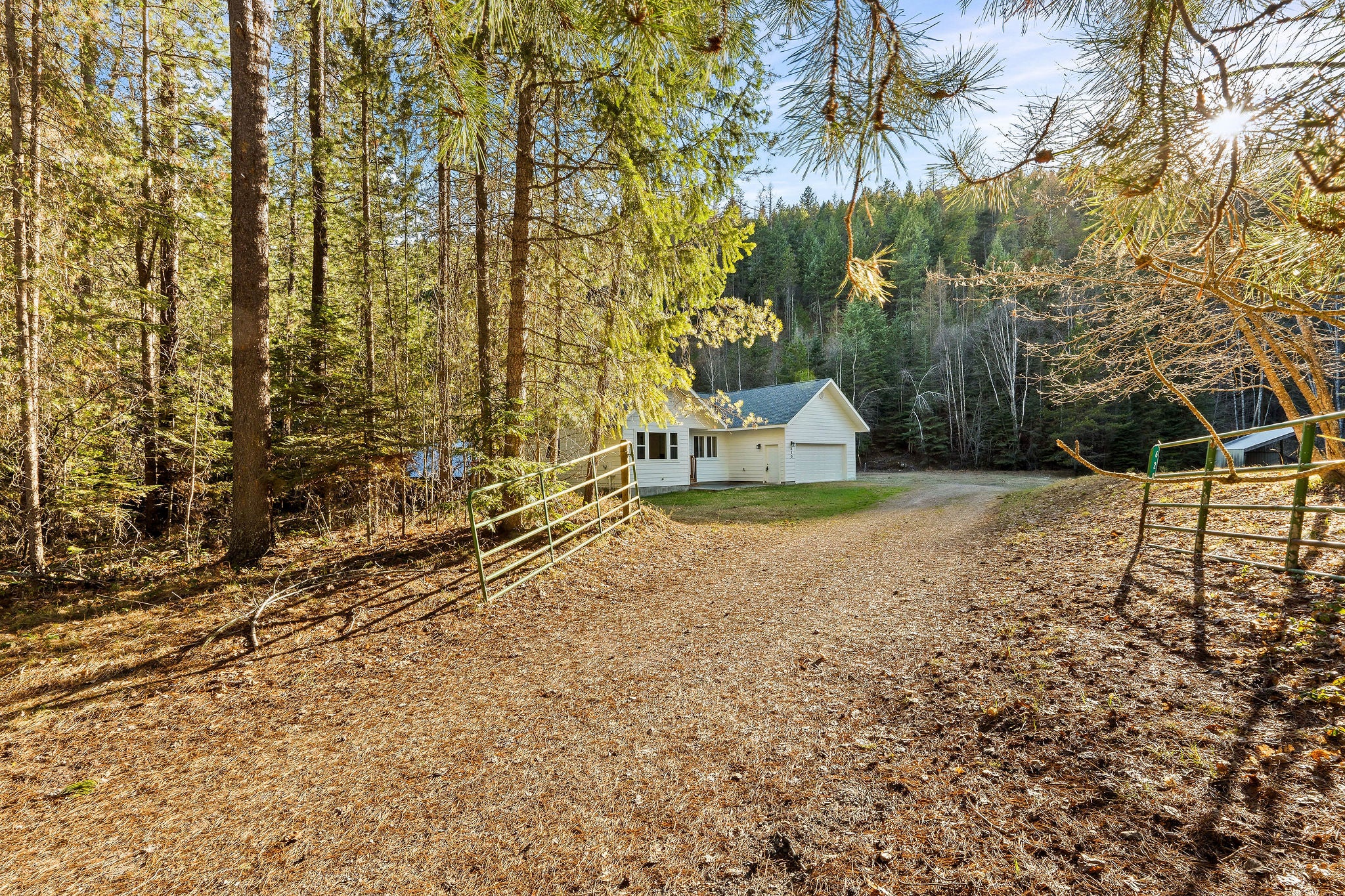620 Swan River Road Bigfork, MT 59911 - Photo 2 of 50 Very Private location with gate at entrance