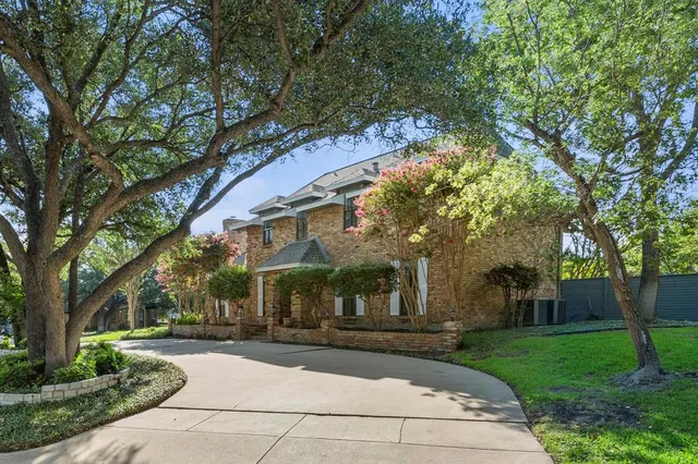 a view of a building with a garden