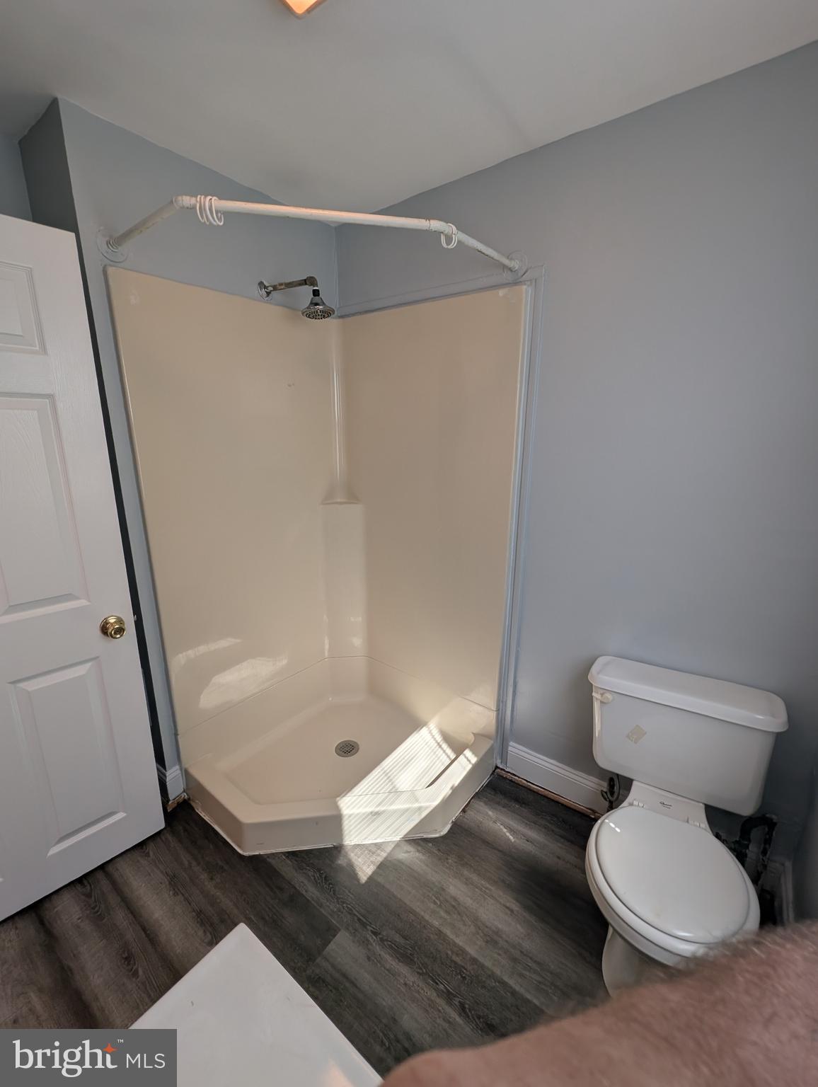 1835 North Bond Street Baltimore, MD 21213 - Photo 12 of 25 a bathroom with a toilet and a shower