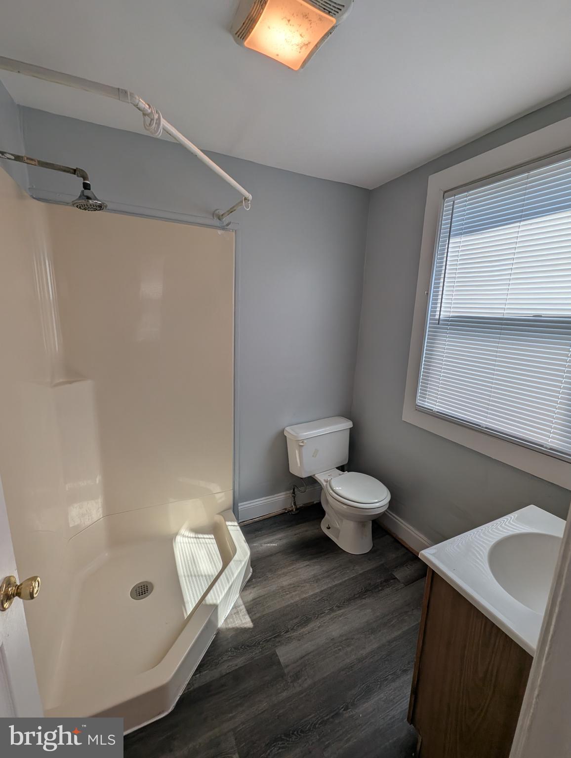 1835 North Bond Street Baltimore, MD 21213 - Photo 13 of 25 a bathroom with a toilet sink and shower