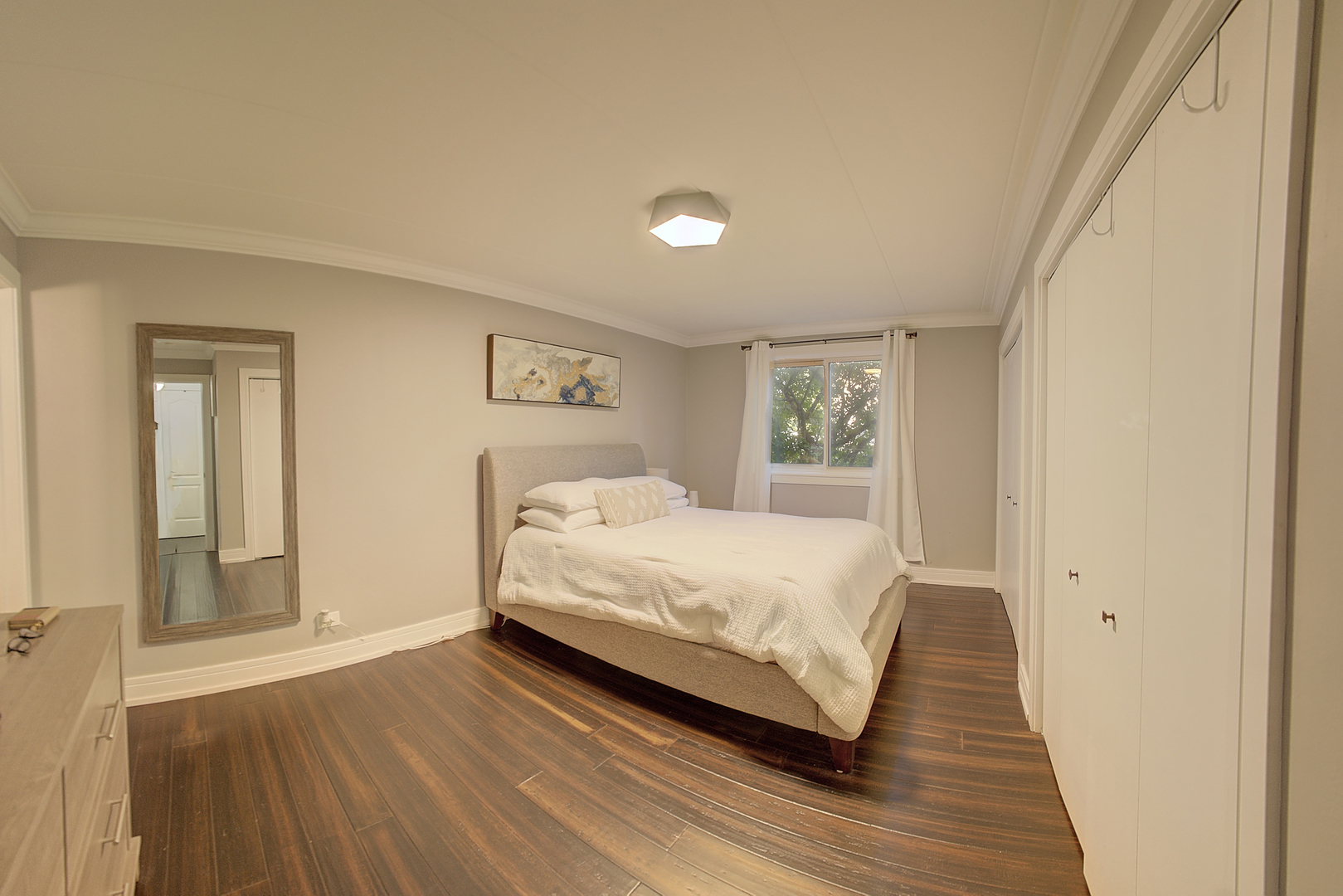 10230 Washington Avenue, Unit 1D Oak Lawn, IL 60453 - Photo 16 of 19 a bedroom with a bed and wooden floor