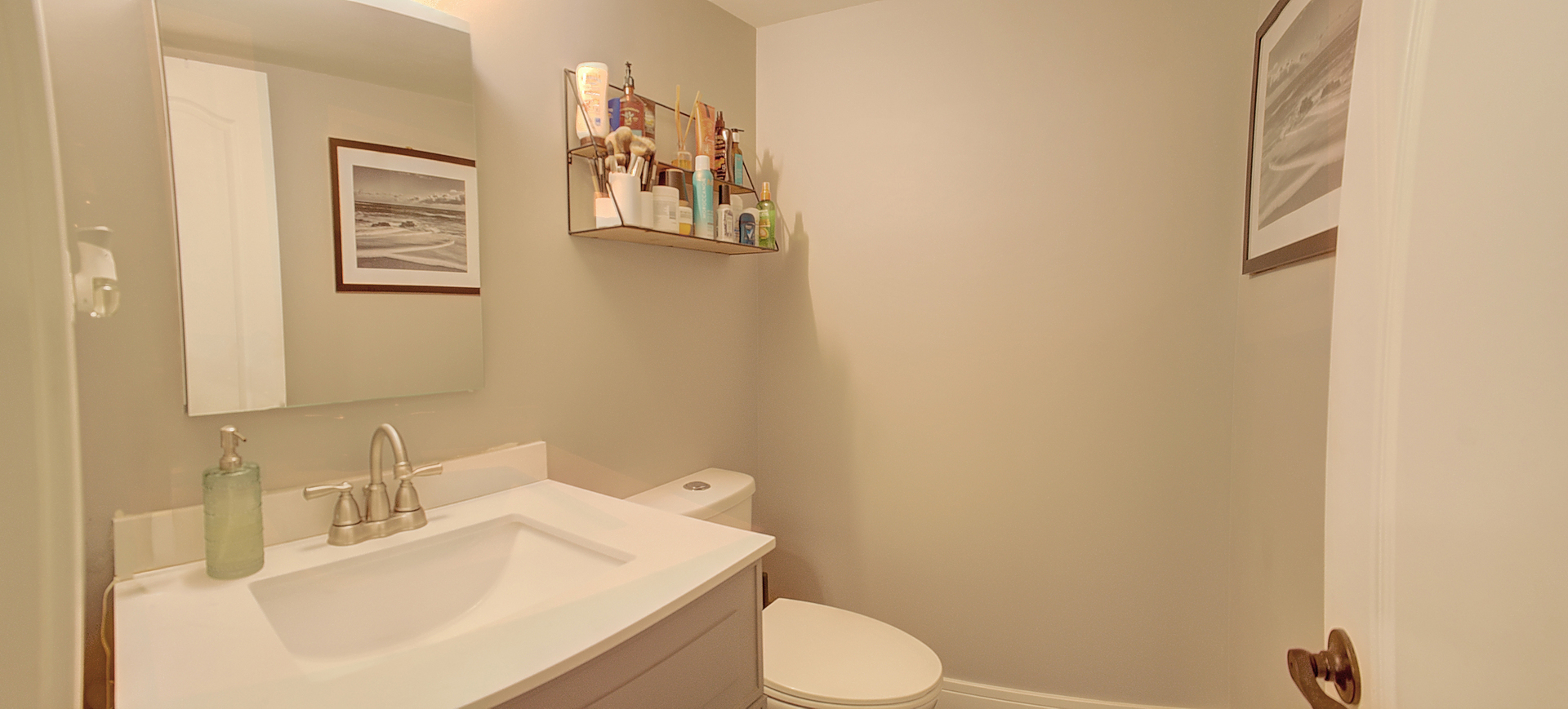 10230 Washington Avenue, Unit 1D Oak Lawn, IL 60453 - Photo 18 of 19 a bathroom with a sink vanity mirror and toilet