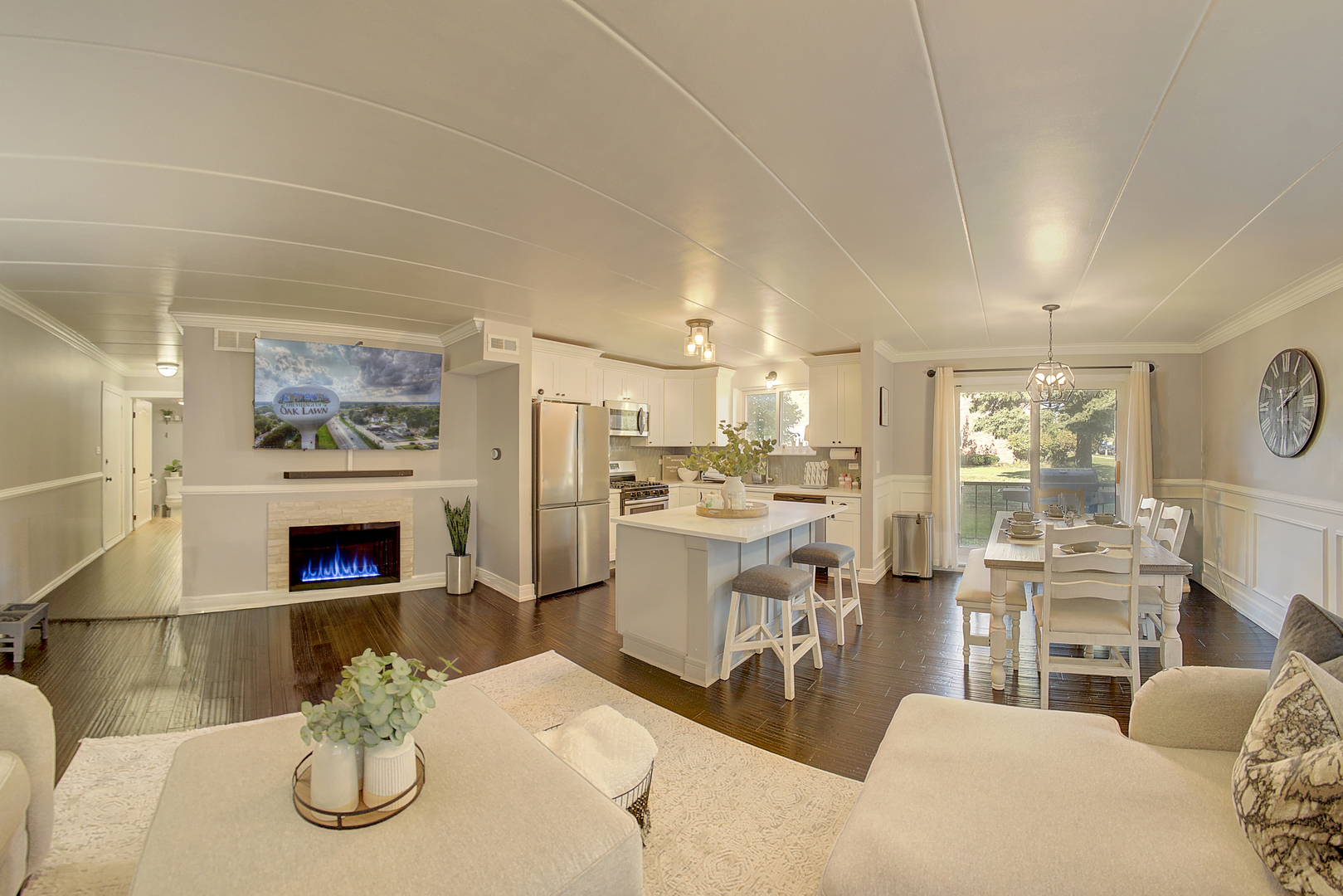 10230 Washington Avenue, Unit 1D Oak Lawn, IL 60453 - Photo 8 of 19 a living room with furniture a fireplace and kitchen view