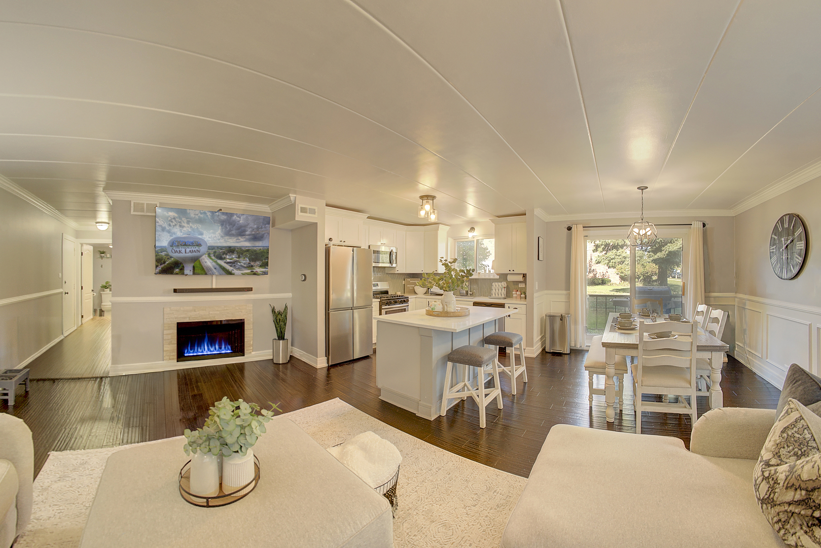 10230 Washington Avenue, Unit 1D Oak Lawn, IL 60453 - Photo 9 of 19 a living room with furniture a fireplace and kitchen view