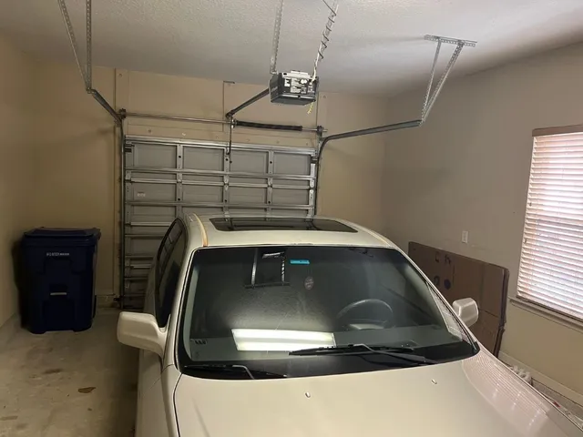 a bedroom with a bed and the dresser