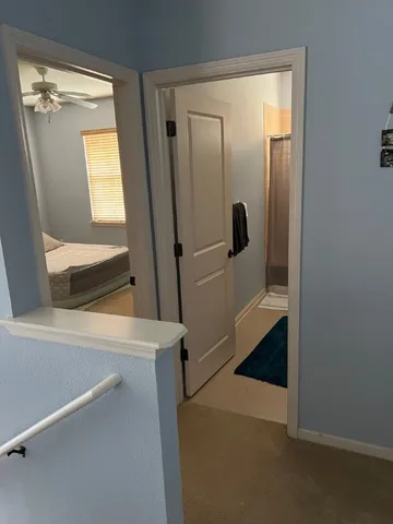 a view of a room with windows