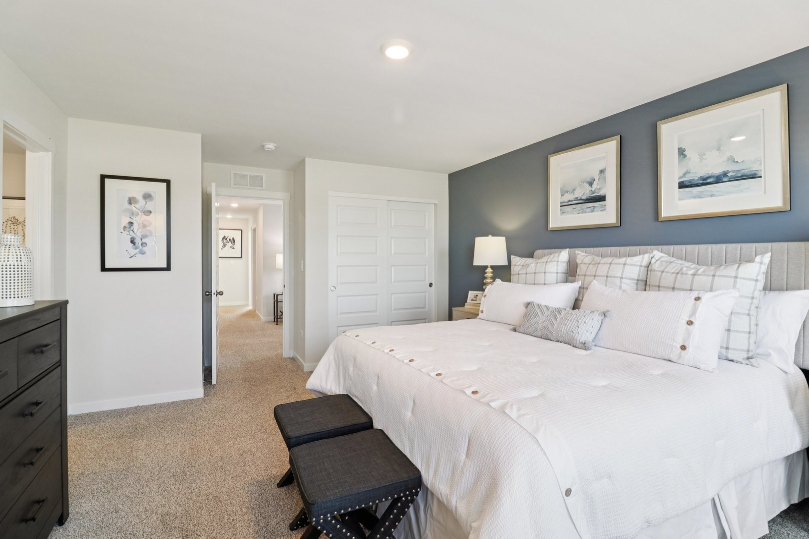 1721 Stable Lane Aurora, IL 60503 - Photo 22 of 34 a bedroom with a bed and a painting on the wall