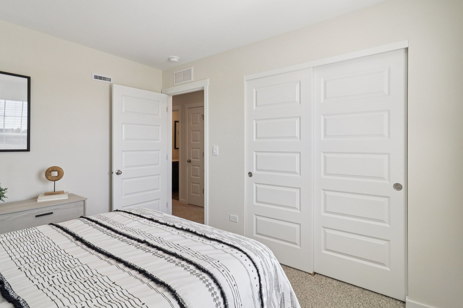 1721 Stable Lane Aurora, IL 60503 - Photo 31 of 34 a bedroom with a bed and a lamp
