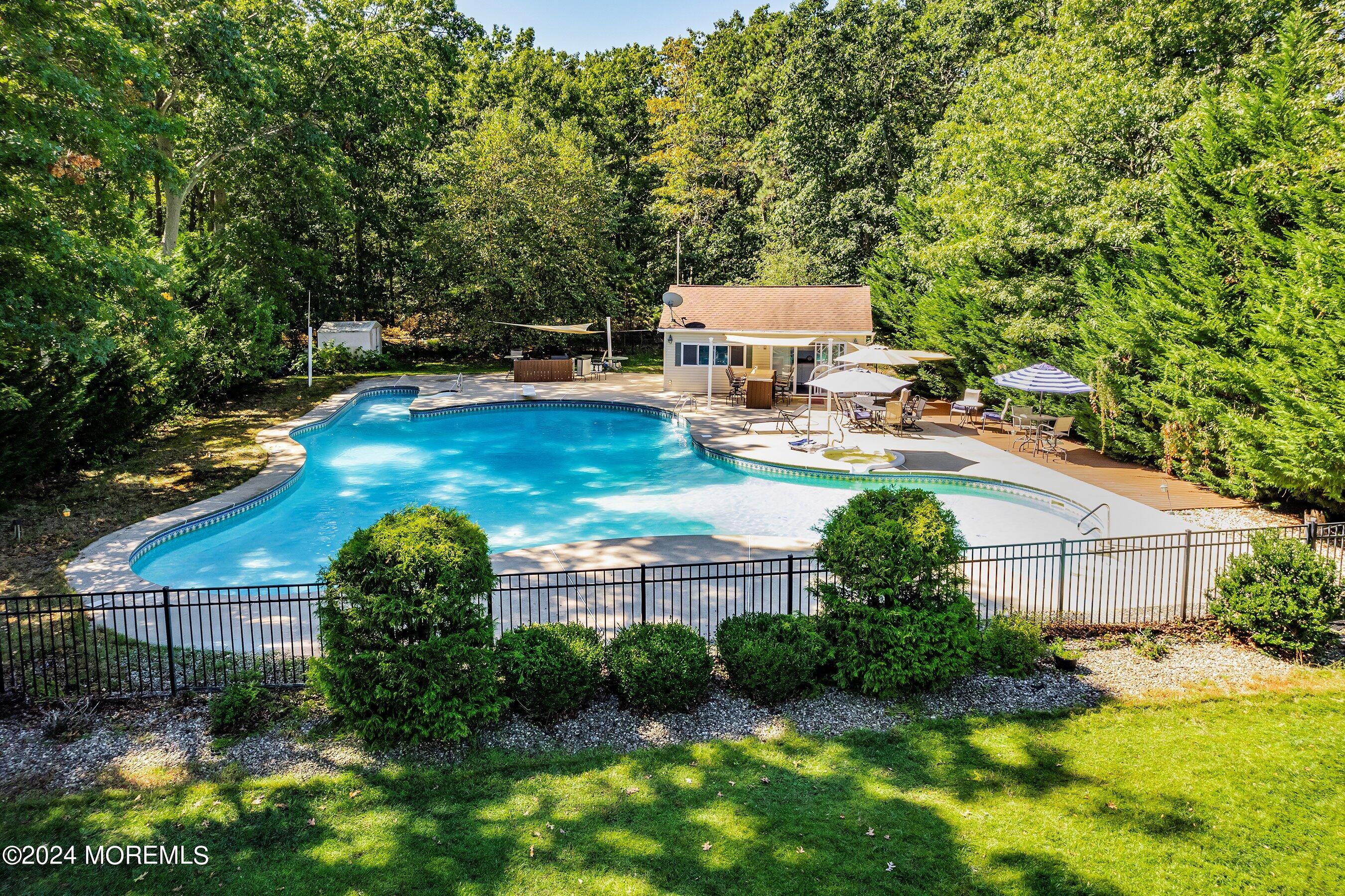17 Glacier Drive Howell, NJ 07731 - Photo 2 of 43 a view of a house with backyard and sitting area