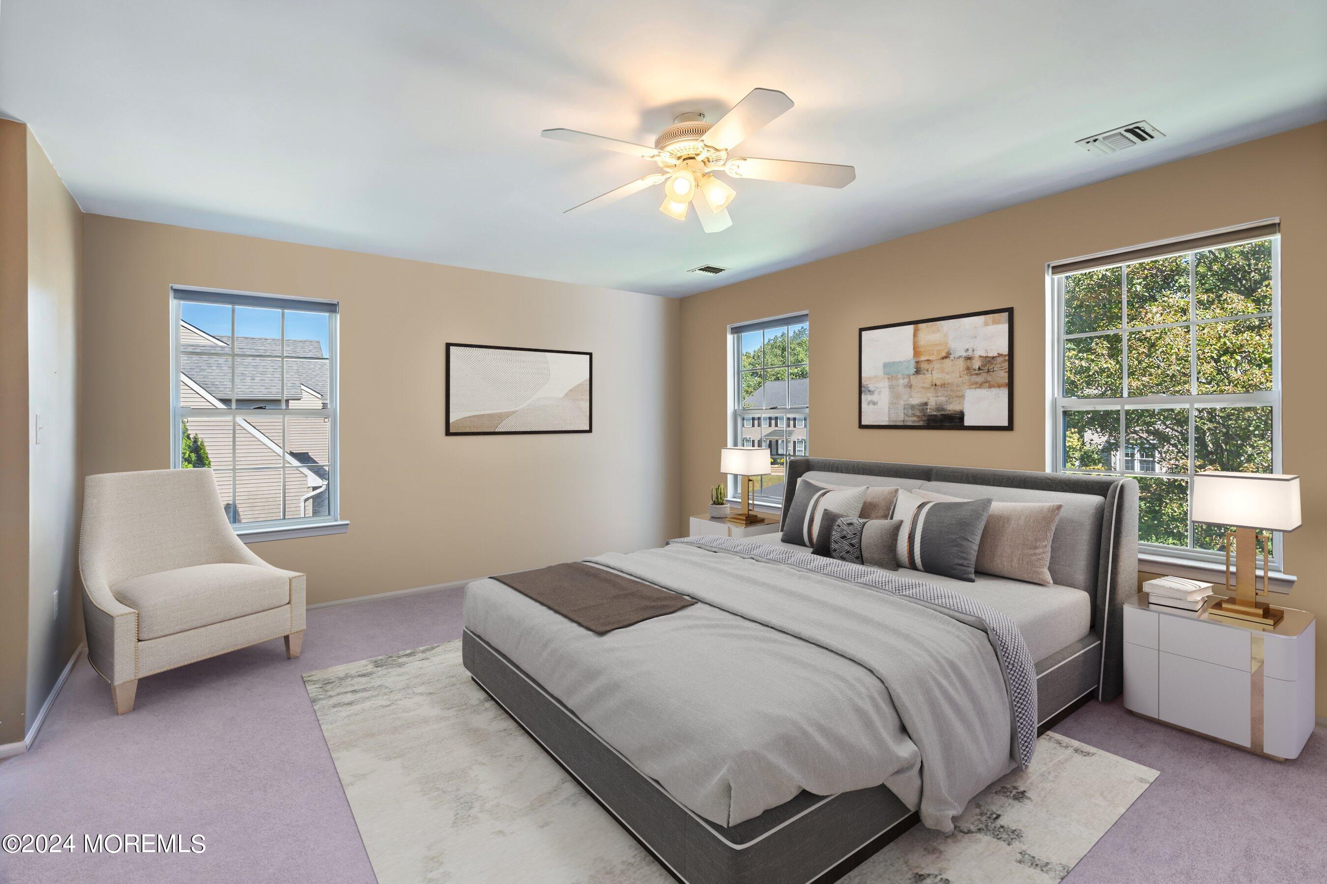 17 Glacier Drive Howell, NJ 07731 - Photo 23 of 43 a bedroom with a large bed and a couch