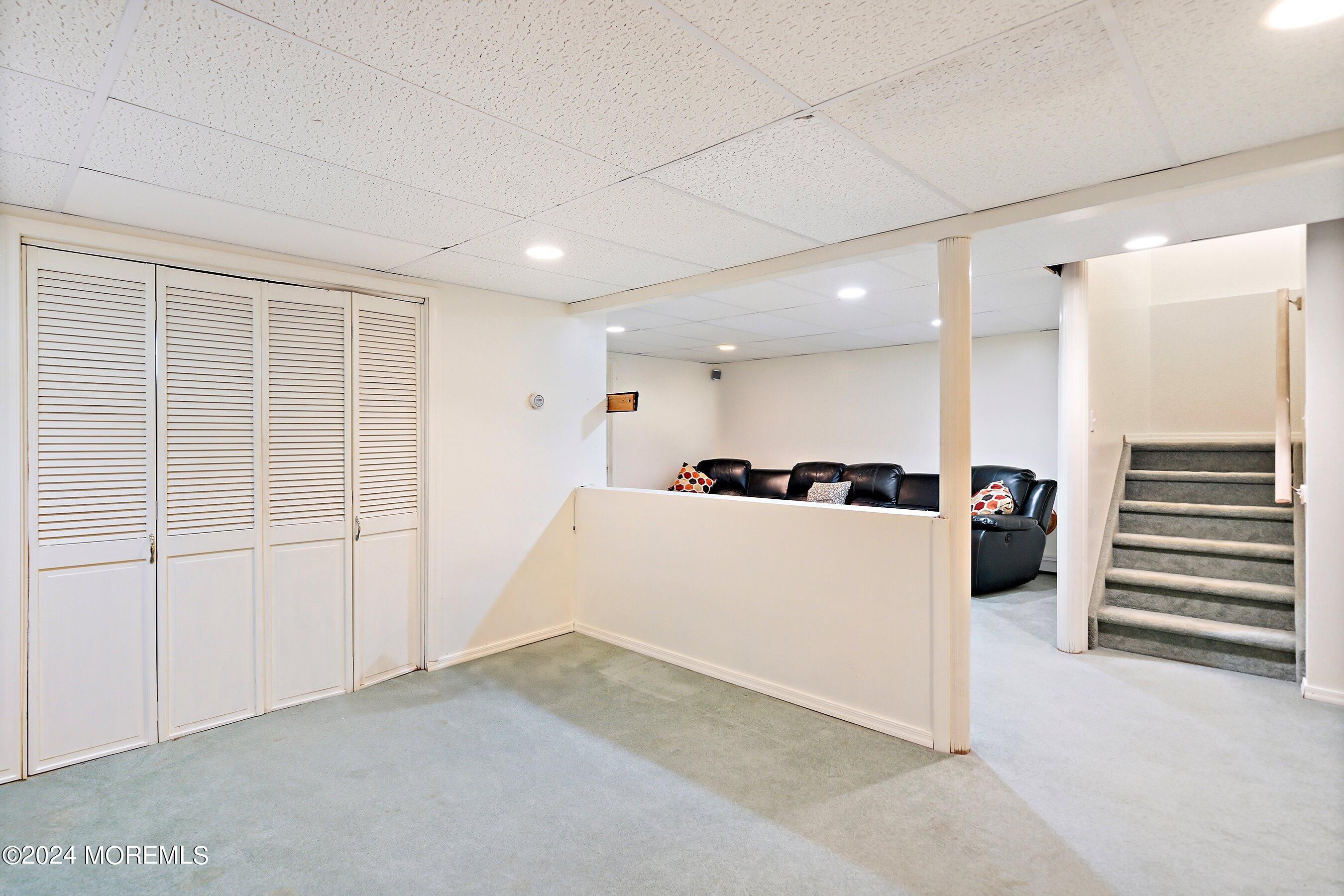 17 Glacier Drive Howell, NJ 07731 - Photo 25 of 43 a view of a big room with closet and windows