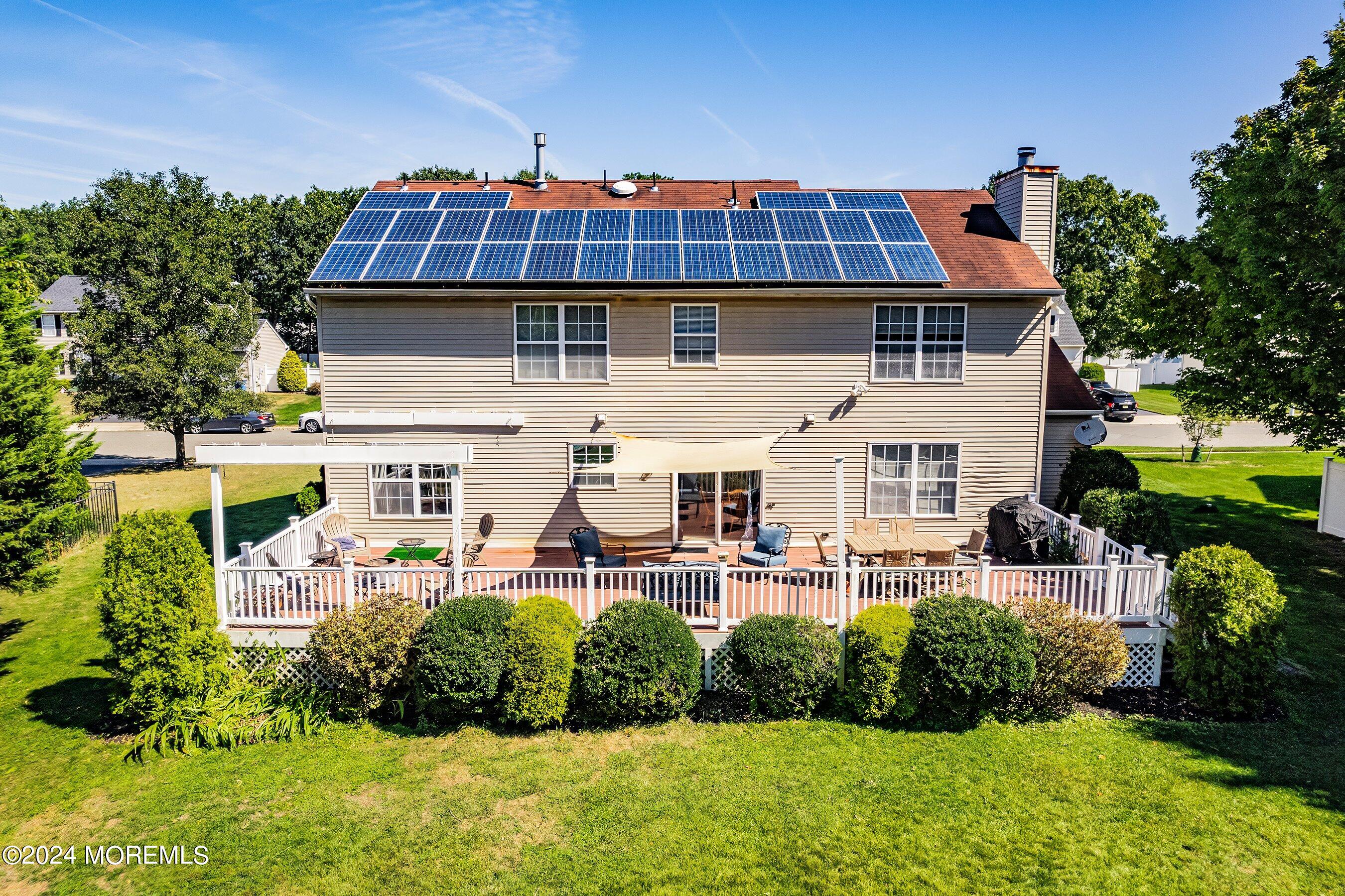 17 Glacier Drive Howell, NJ 07731 - Photo 29 of 43 a view of a house with patio and garden