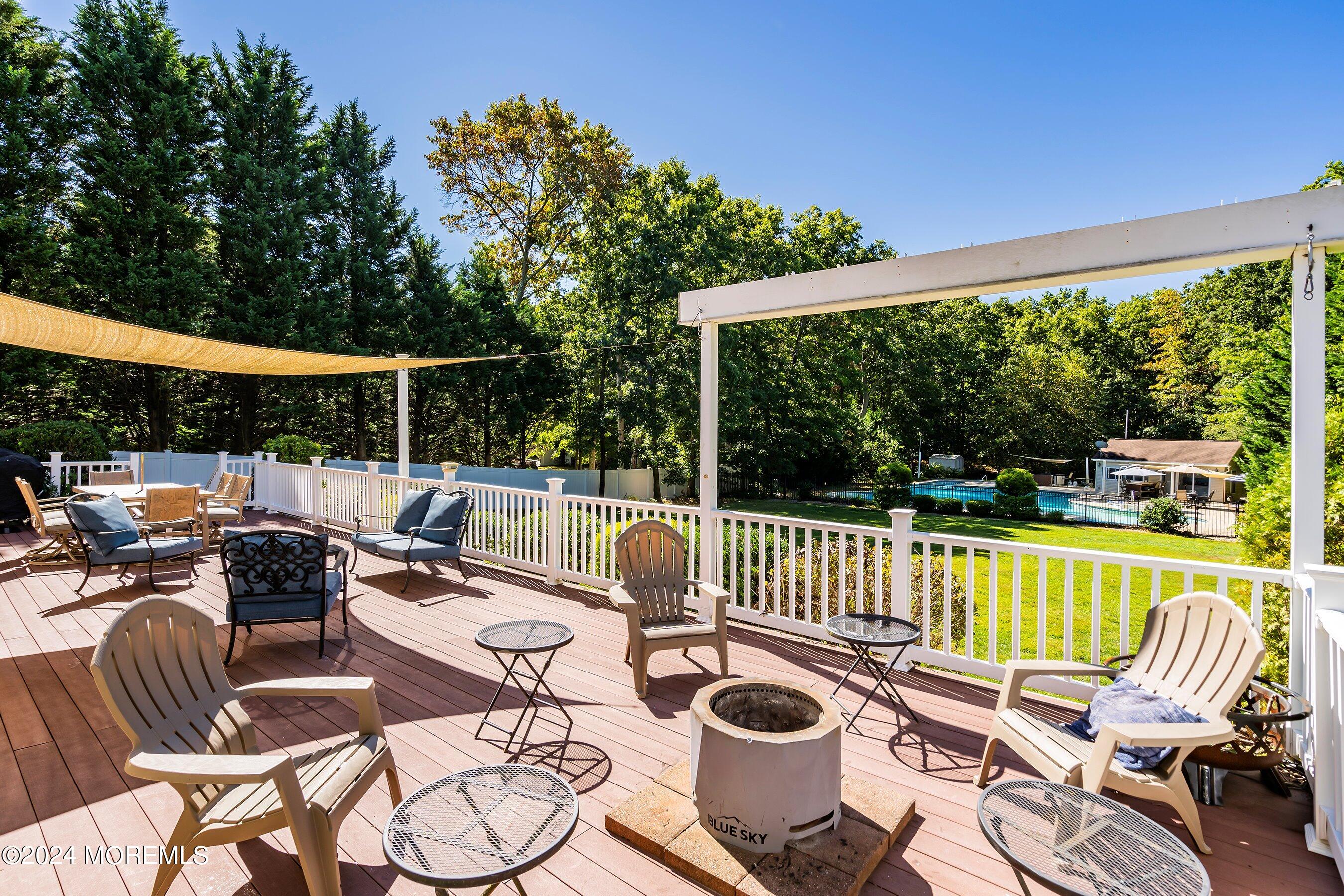 17 Glacier Drive Howell, NJ 07731 - Photo 30 of 43 a view of a patio with a table chairs and a patio