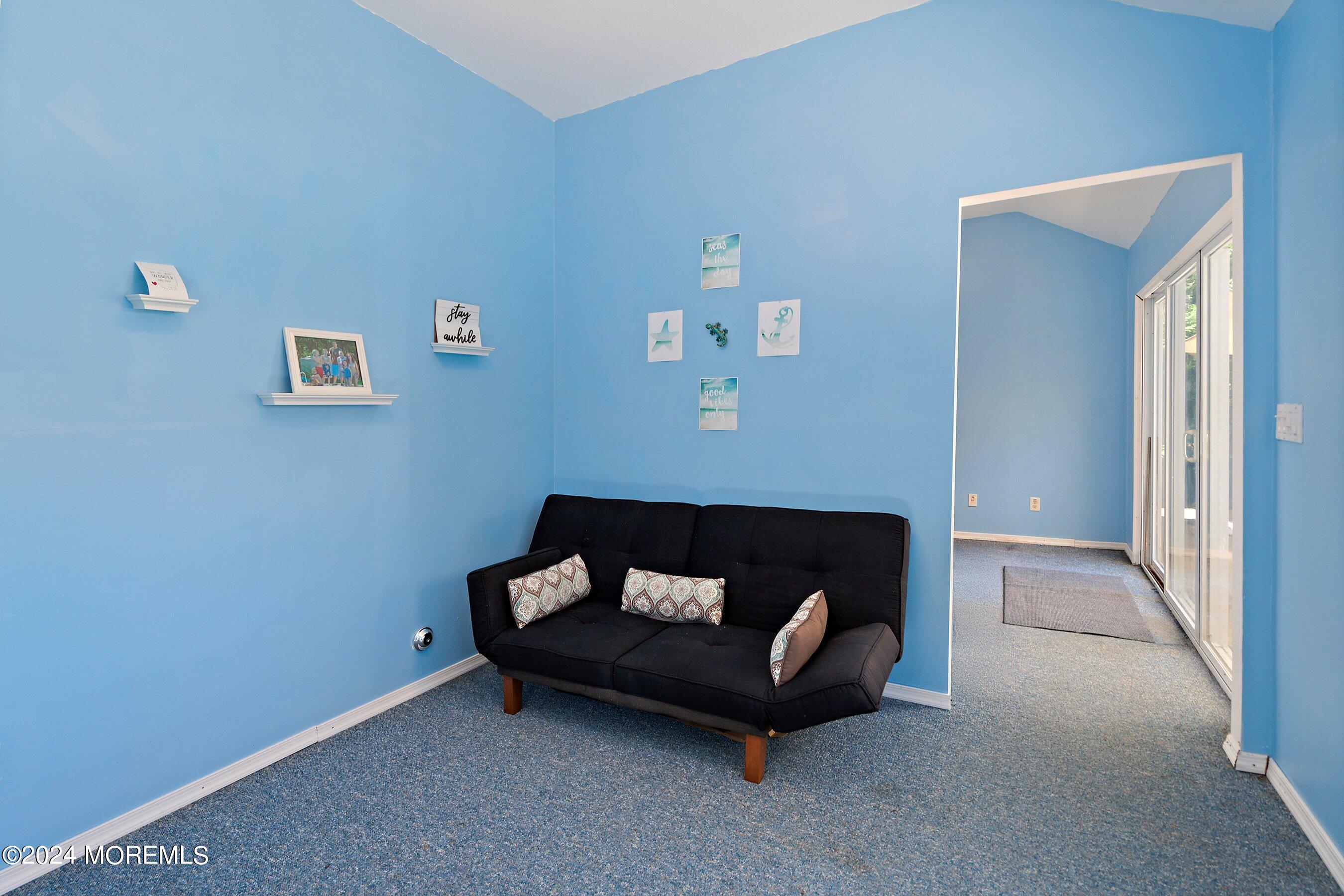 17 Glacier Drive Howell, NJ 07731 - Photo 39 of 43 a living room with furniture and a window
