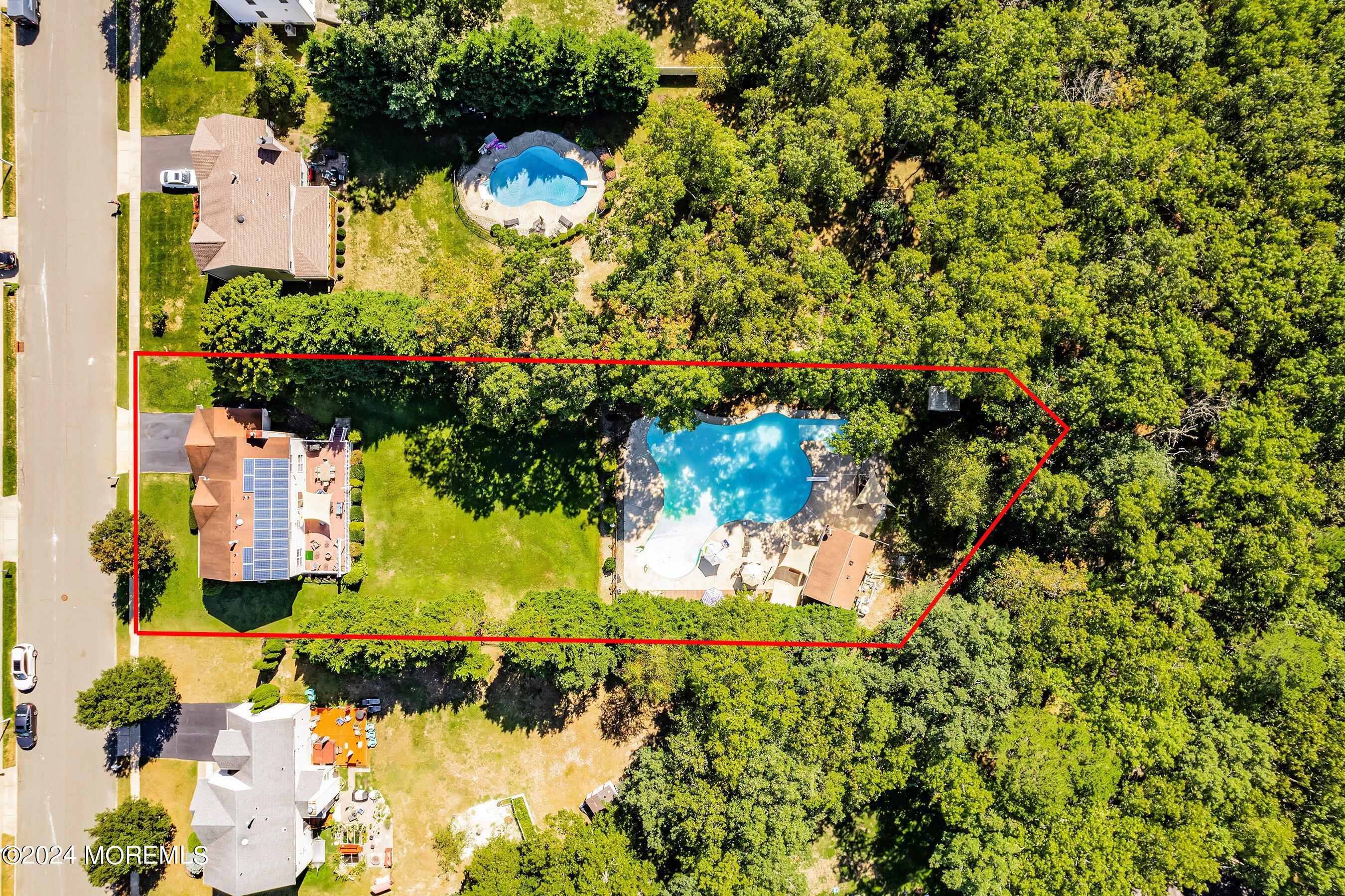 17 Glacier Drive Howell, NJ 07731 - Photo 40 of 43 a view of a garden