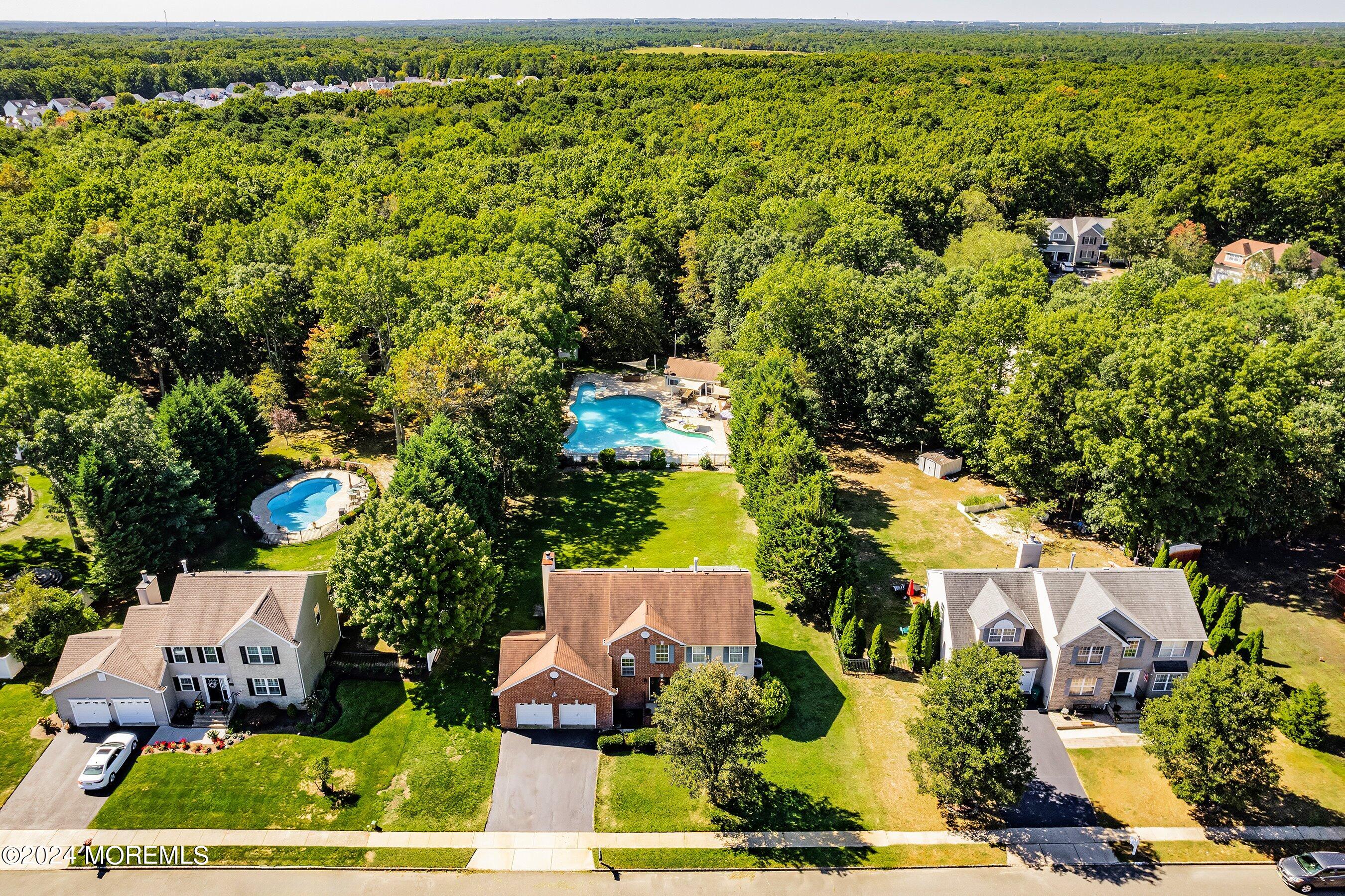 17 Glacier Drive Howell, NJ 07731 - Photo 4 of 43 an aerial view of multiple house
