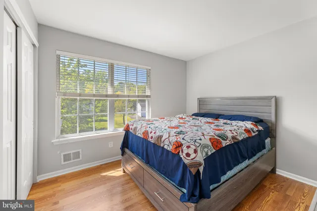 a bathroom with a sink toilet and a mirror