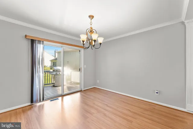 a bathroom with a sink toilet and a mirror