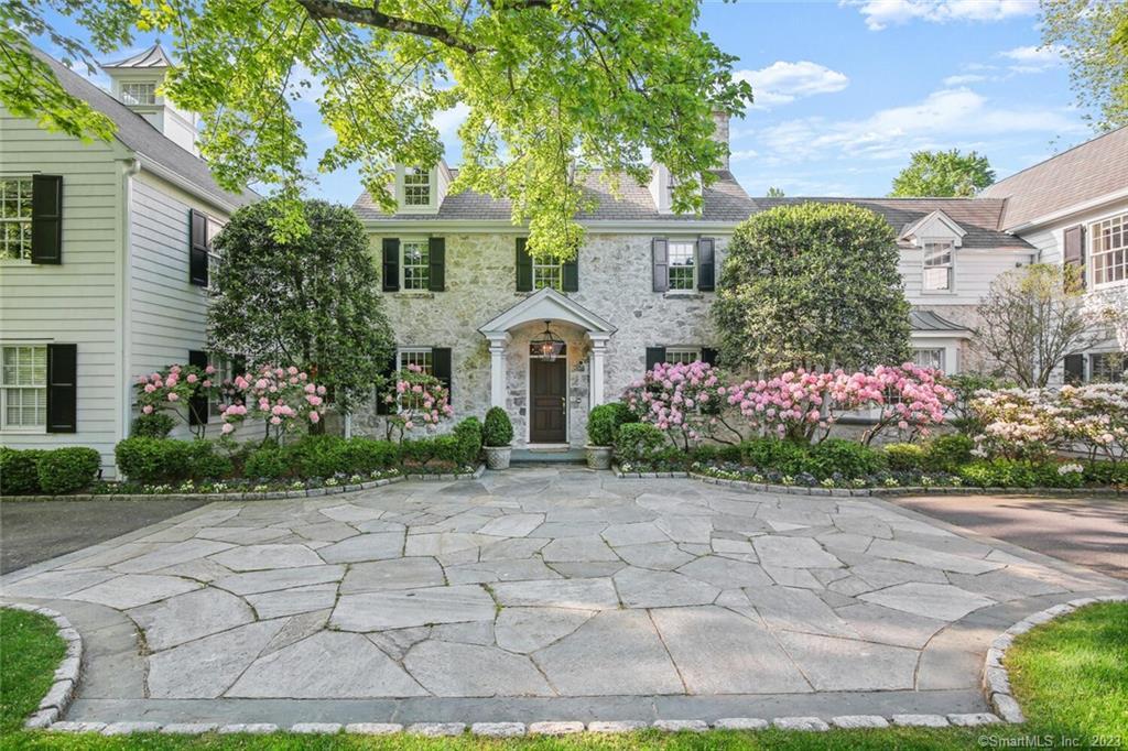 42 St Nicholas Road Darien, CT 06820 - Photo 1 of 1 a front view of a house with garden