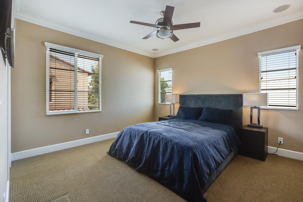 1420 Dahlia Loop San Jose, CA 95126 - Photo 12 of 36 a bedroom with a bed and window