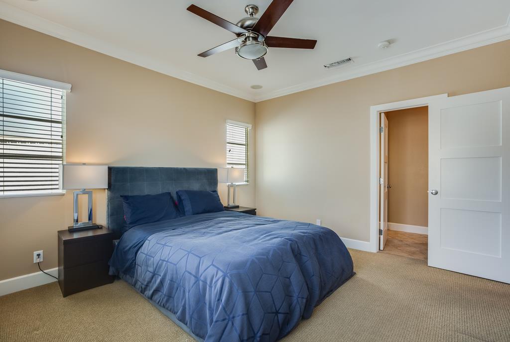 1420 Dahlia Loop San Jose, CA 95126 - Photo 13 of 36 a bedroom with a bed and window