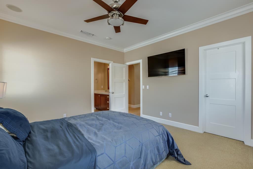1420 Dahlia Loop San Jose, CA 95126 - Photo 14 of 36 a bedroom with a bed and a flat screen tv