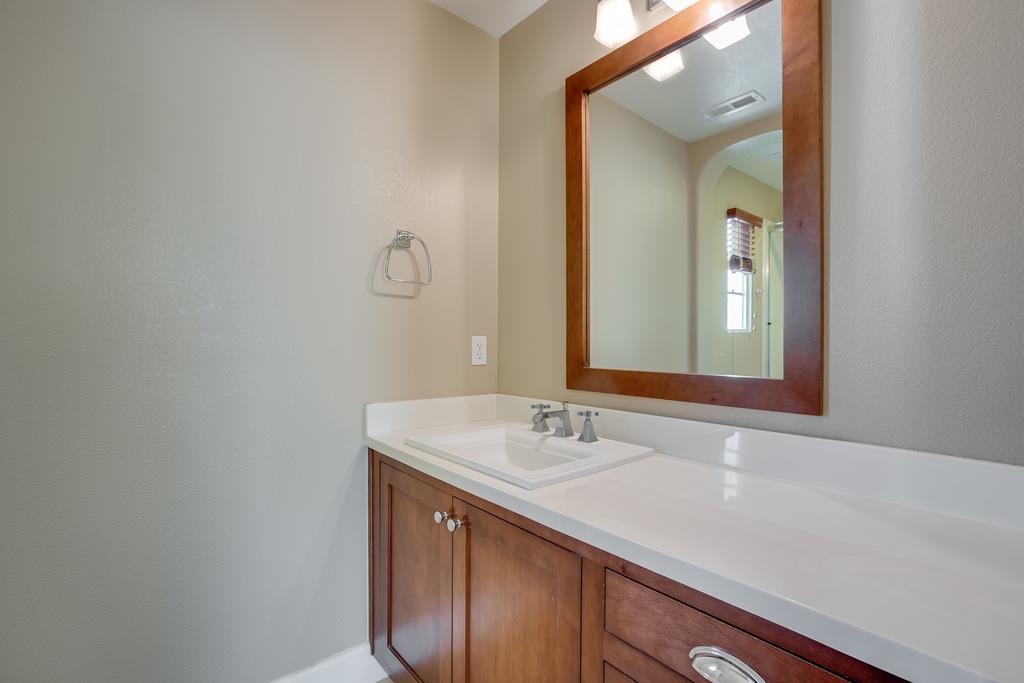 1420 Dahlia Loop San Jose, CA 95126 - Photo 16 of 36 a bathroom with a sink and a mirror