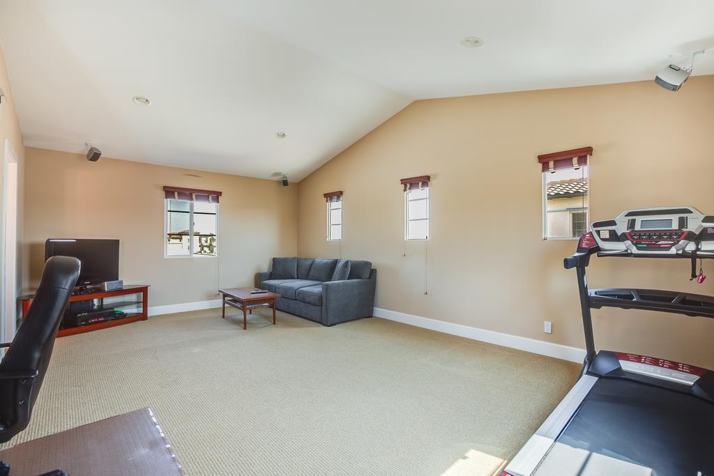 1420 Dahlia Loop San Jose, CA 95126 - Photo 20 of 36 a living room with furniture and a window