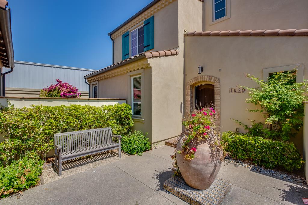 1420 Dahlia Loop San Jose, CA 95126 - Photo 2 of 36 front view of a house with potted plants