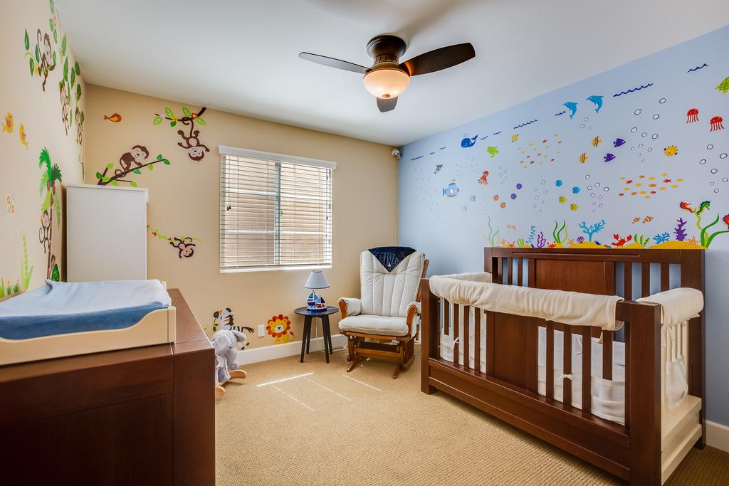 1420 Dahlia Loop San Jose, CA 95126 - Photo 23 of 36 a bedroom with furniture and a window