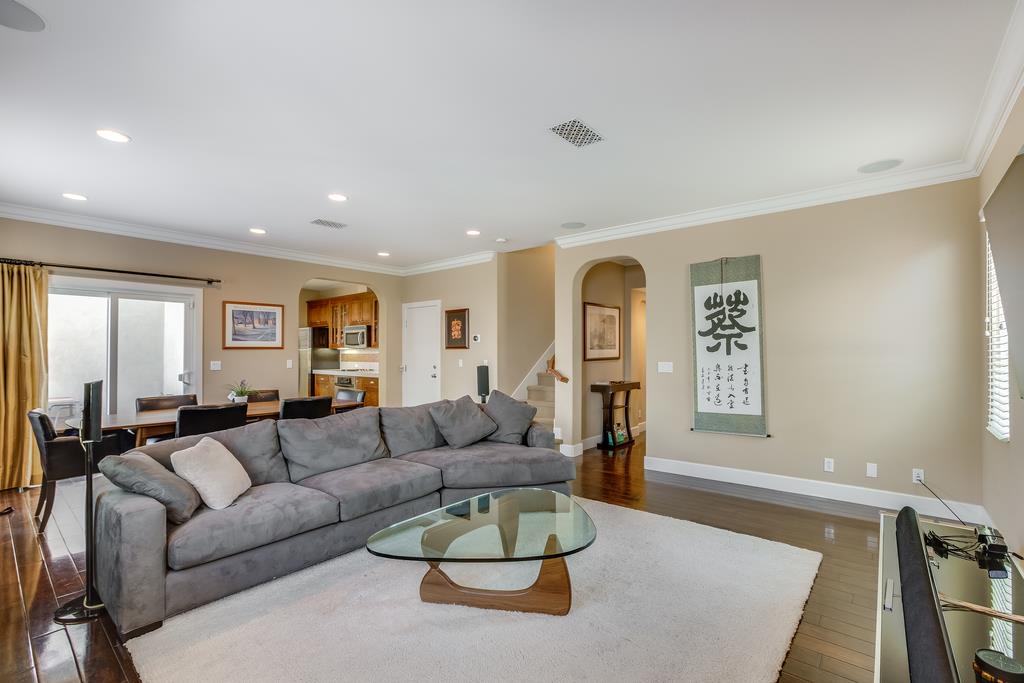 1420 Dahlia Loop San Jose, CA 95126 - Photo 3 of 36 a living room with furniture and a wooden floor