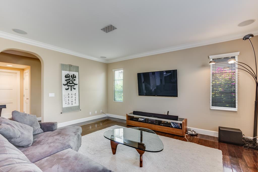 1420 Dahlia Loop San Jose, CA 95126 - Photo 4 of 36 a living room with furniture and a flat screen tv
