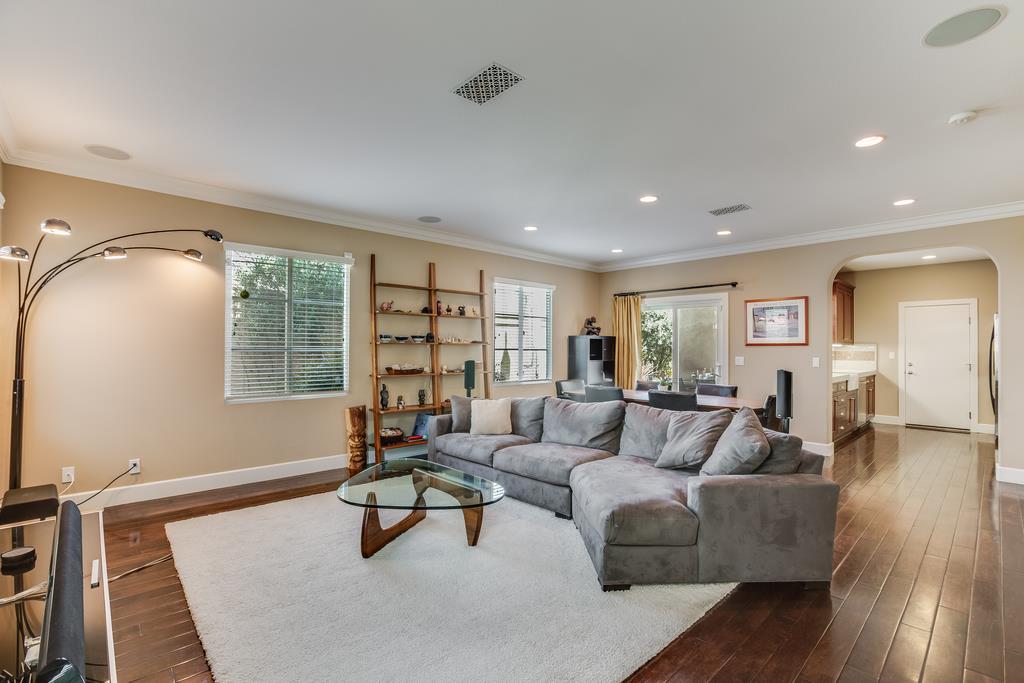 1420 Dahlia Loop San Jose, CA 95126 - Photo 6 of 36 a living room with furniture and wooden floor