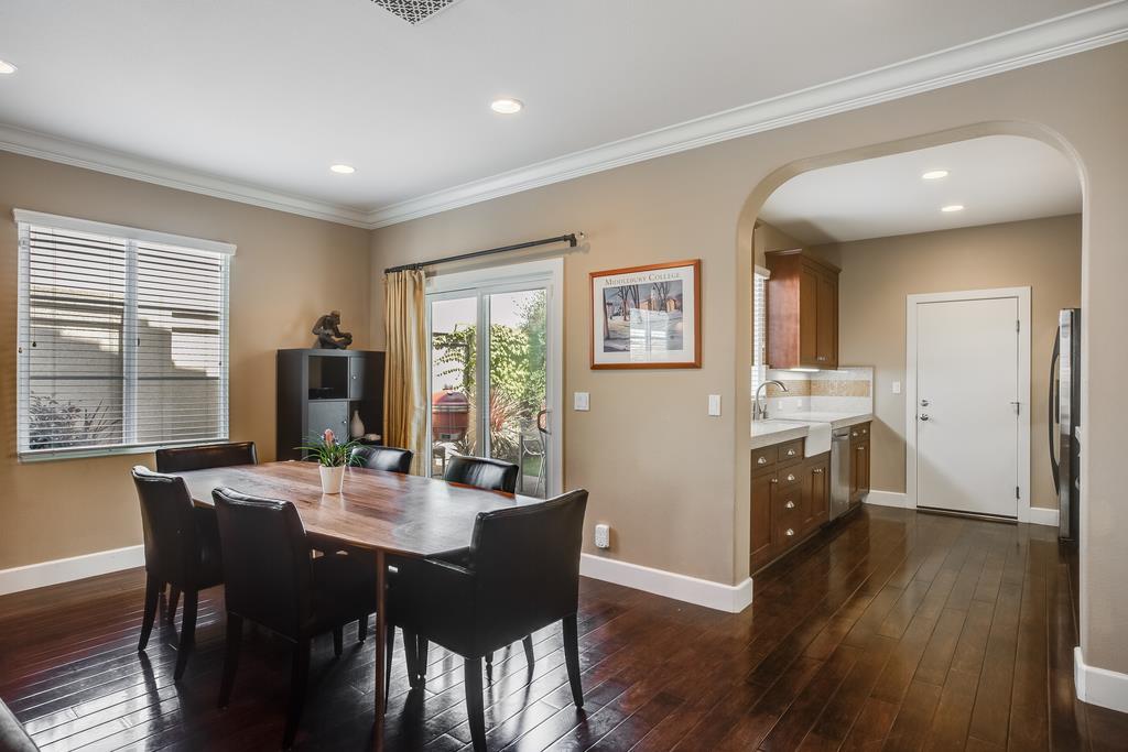 1420 Dahlia Loop San Jose, CA 95126 - Photo 9 of 36 a view of a dining room with furniture and wooden floor
