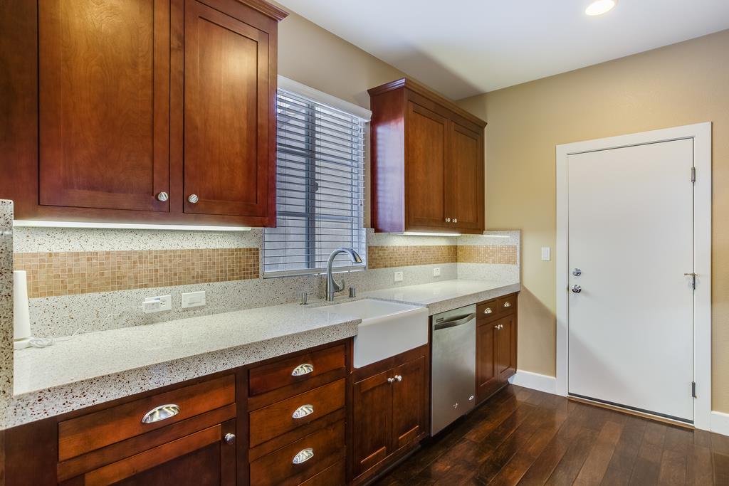 1420 Dahlia Loop San Jose, CA 95126 - Photo 10 of 36 a kitchen with a sink and cabinets