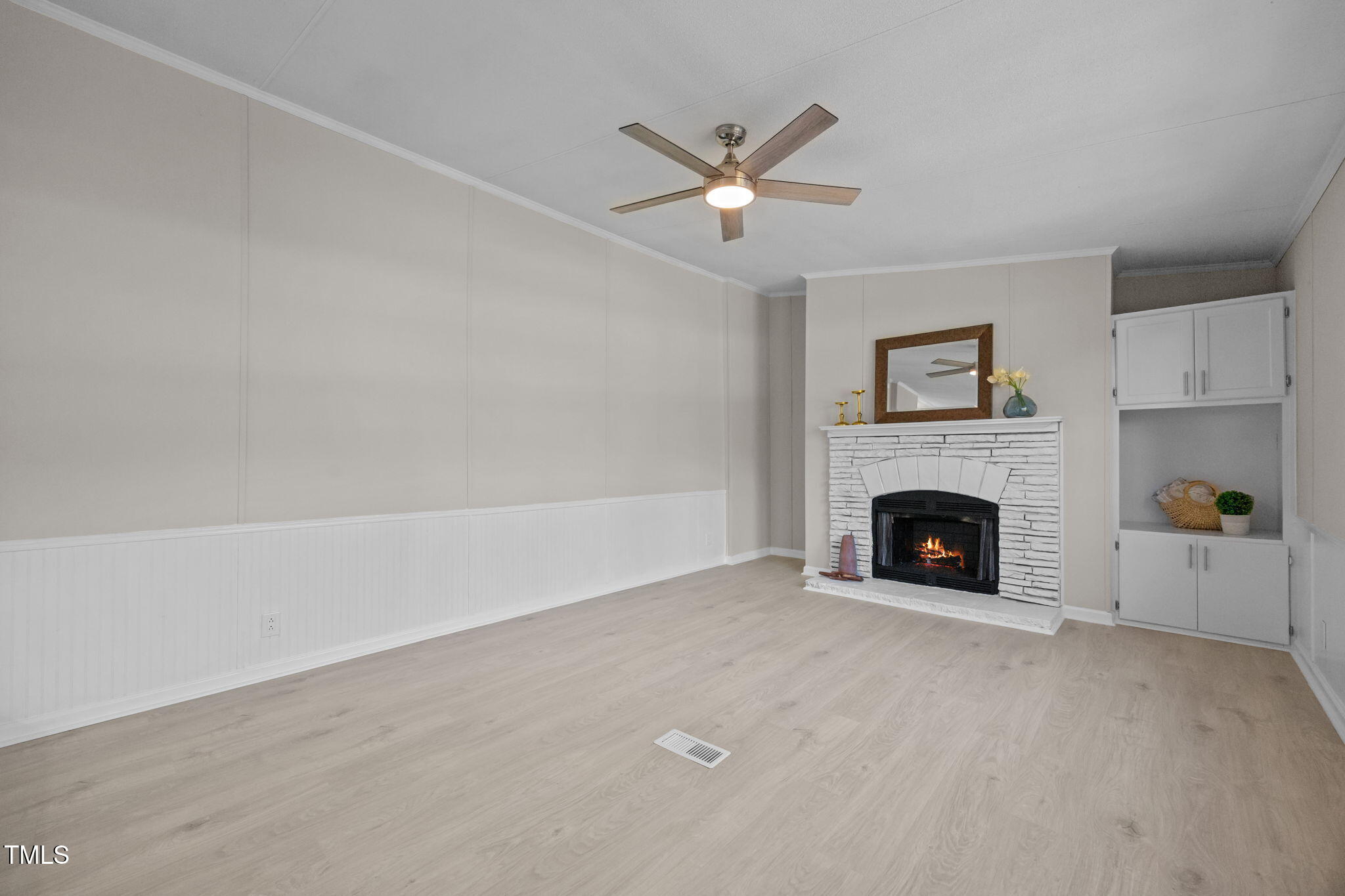 261 Ragland Lane Henderson, NC 27537 - Photo 15 of 58 a view of an empty room with a fireplace