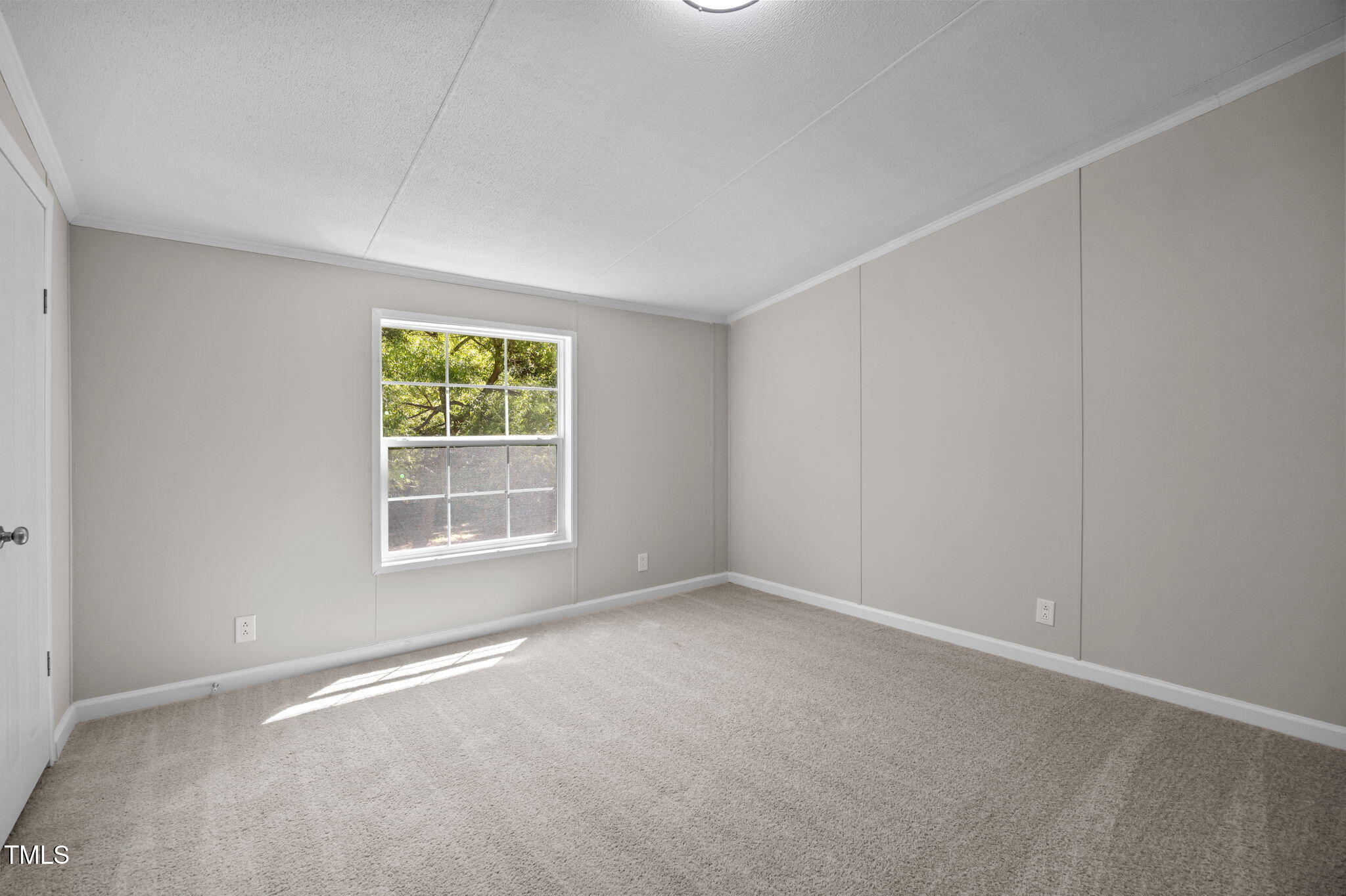 261 Ragland Lane Henderson, NC 27537 - Photo 28 of 58 an empty room with a window