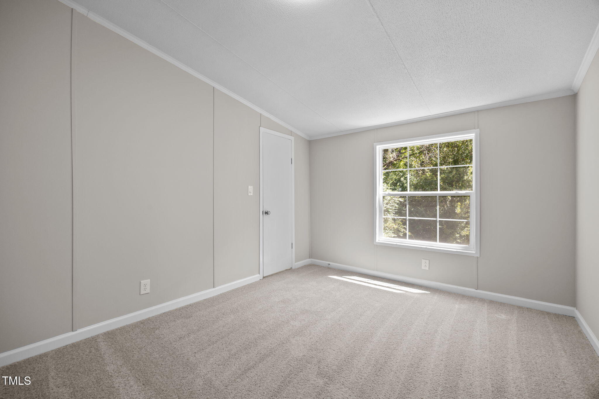 261 Ragland Lane Henderson, NC 27537 - Photo 30 of 58 an empty room with a window