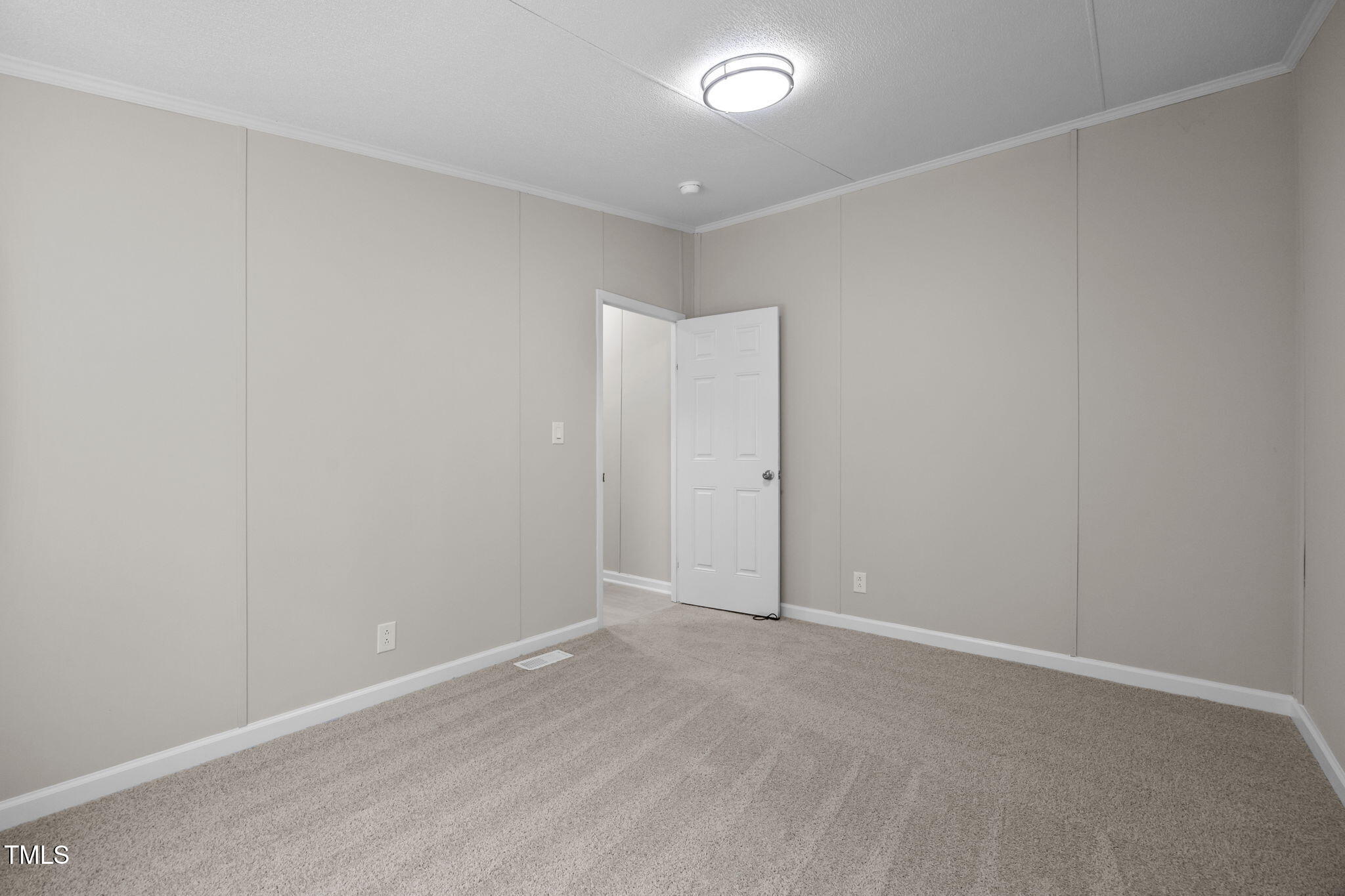 261 Ragland Lane Henderson, NC 27537 - Photo 31 of 58 an empty room with an empty space