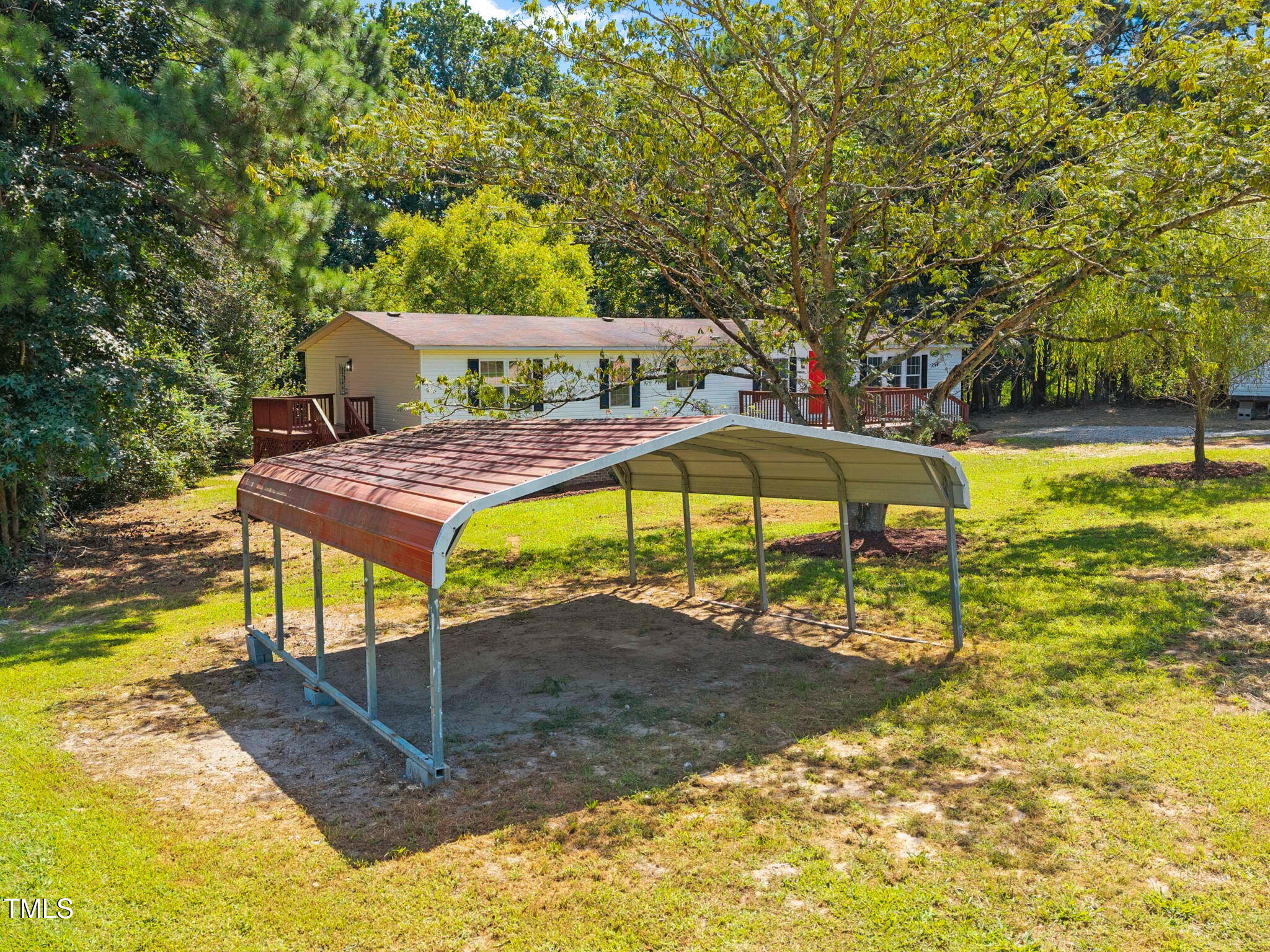261 Ragland Lane Henderson, NC 27537 - Photo 45 of 58 a view of a house with swimming pool