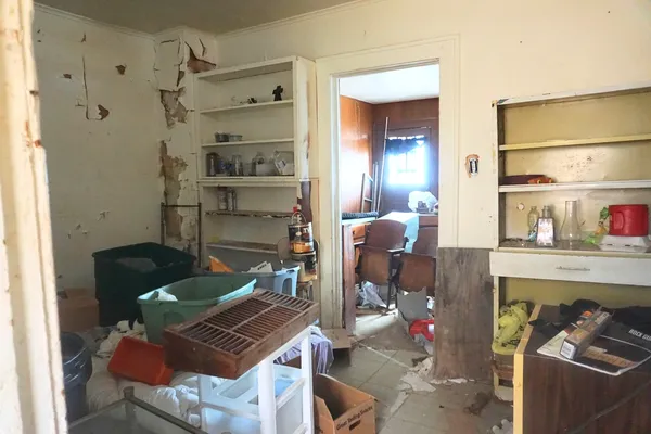 a living room with furniture and window