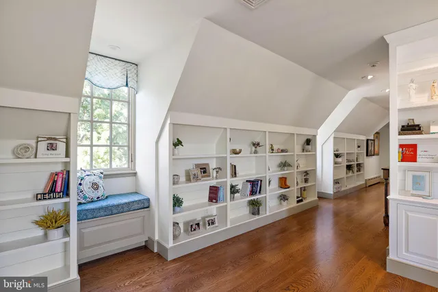 a view of a swimming pool with a yard