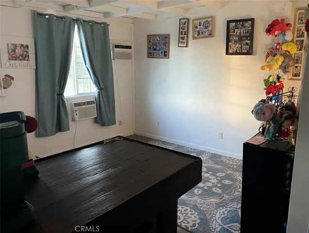 a room with furniture and window