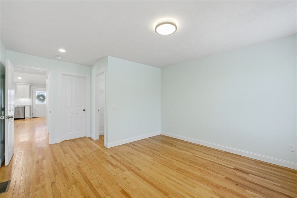 2 Turtle Lane, Unit 2 Sterling, MA 01564 - Photo 20 of 40 a view of empty room with wooden floor