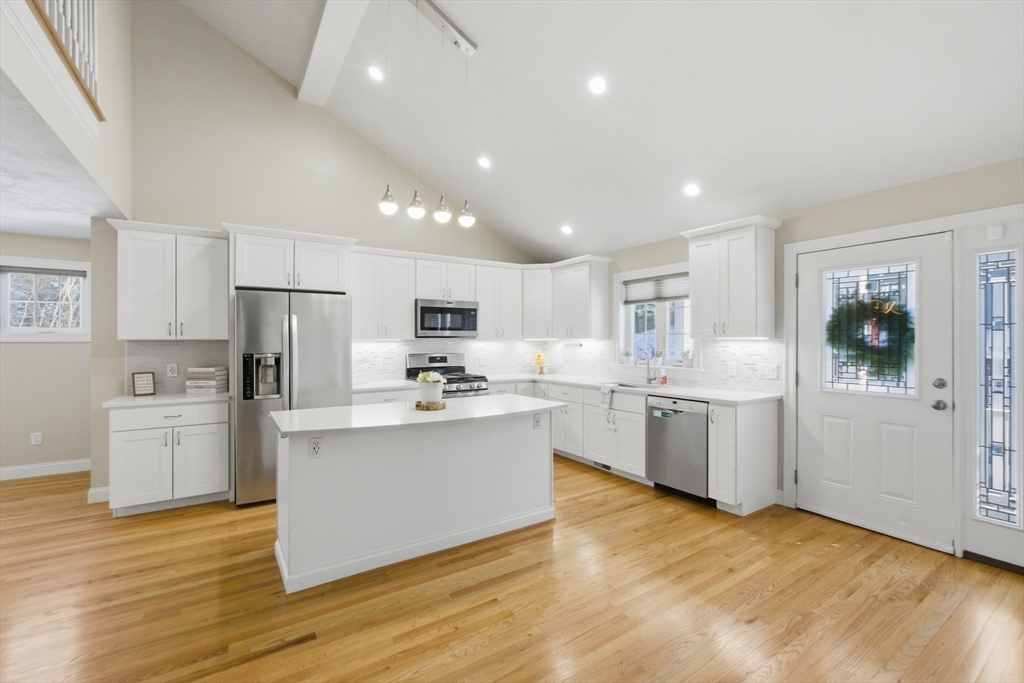 2 Turtle Lane, Unit 2 Sterling, MA 01564 - Photo 2 of 40 a kitchen with refrigerator and cabinets