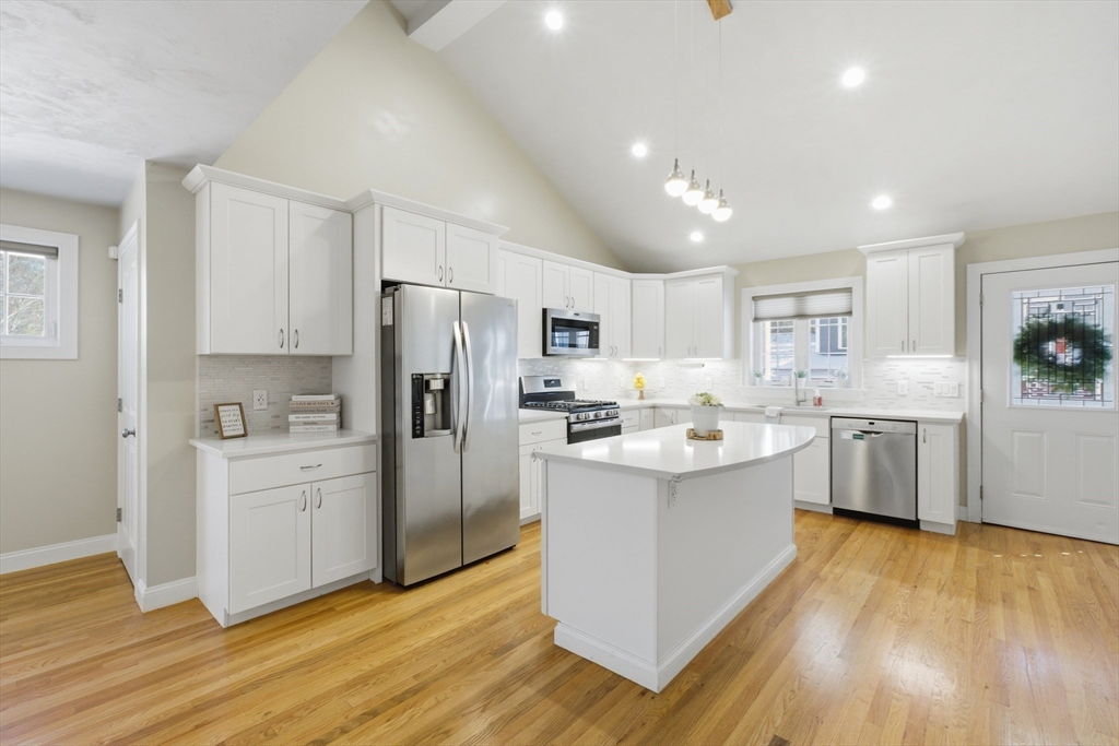 2 Turtle Lane, Unit 2 Sterling, MA 01564 - Photo 3 of 40 a kitchen with white cabinets and stainless steel appliances