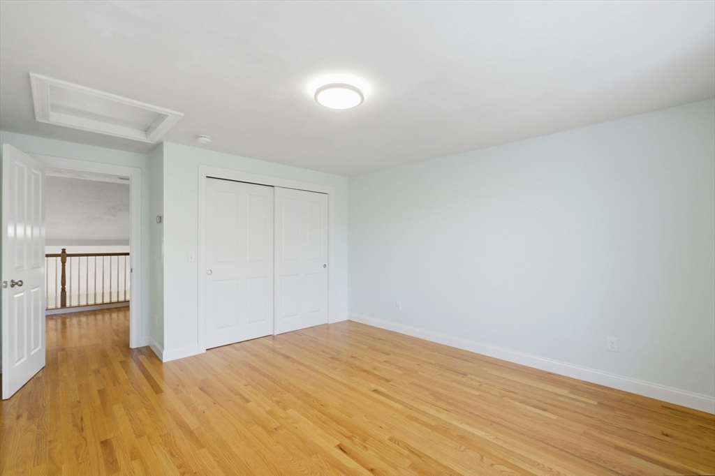 2 Turtle Lane, Unit 2 Sterling, MA 01564 - Photo 32 of 40 a view of empty room with wooden floor
