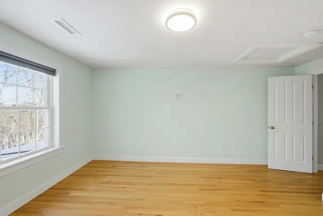 a view of an empty room with window